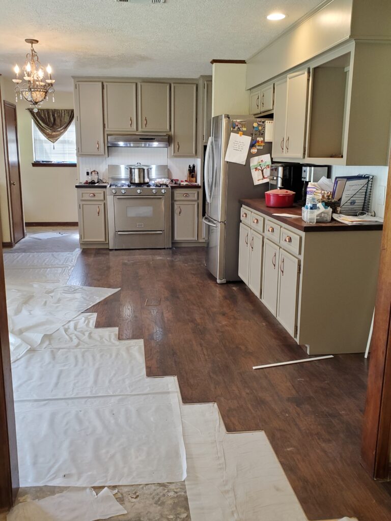 laying flooring for our kitchen remodel